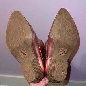 Pink metallic cowgirl boots.